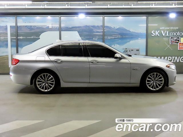 BMW 5-Series 2014 — photo 20