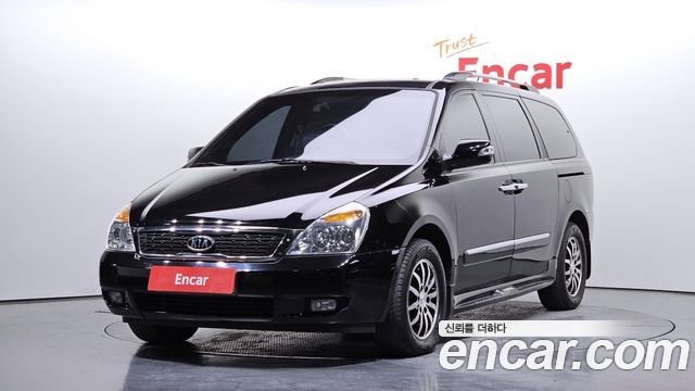 Kia Canival 2010 — photo 1