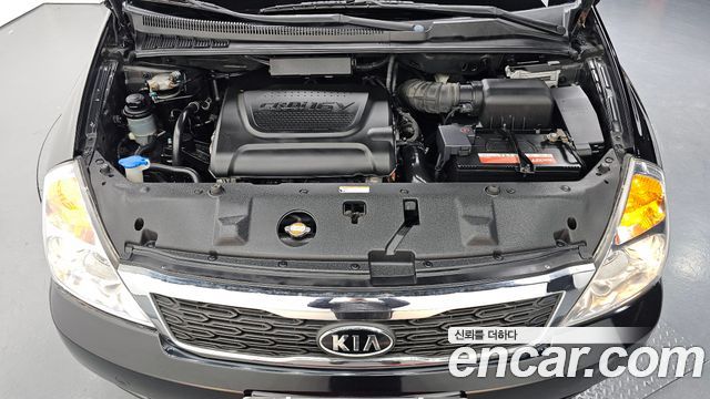 Kia Canival 2010 — photo 6
