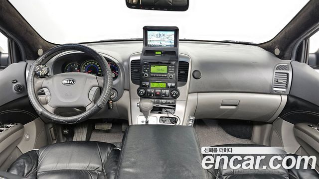 Kia Canival 2010 — photo 7