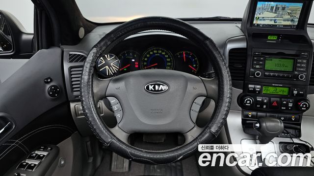 Kia Canival 2010 — photo 12