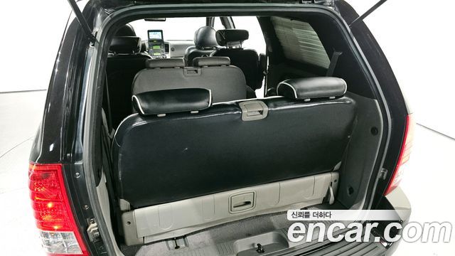 Kia Canival 2010 — photo 20