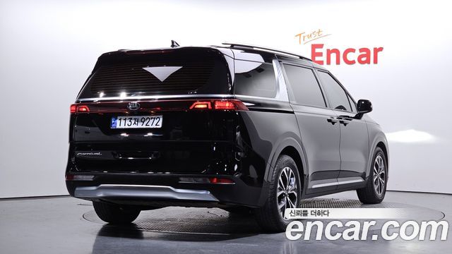 Kia Canival 2021 — photo 2