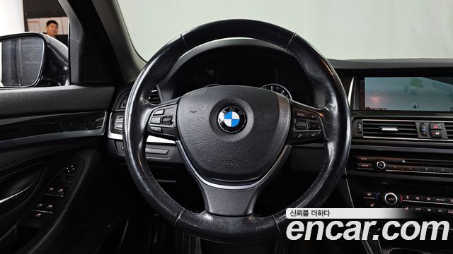 BMW 5-Series 2015 — photo 13