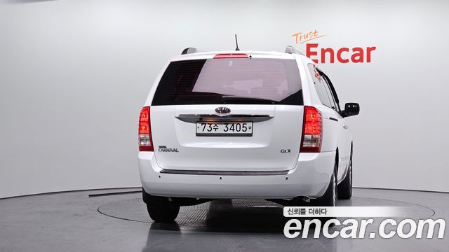 Kia Canival 2012 — photo 4