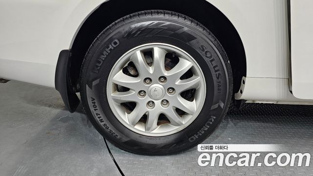 Kia Canival 2012 — photo 5