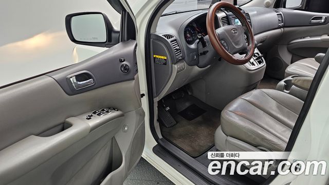 Kia Canival 2012 — photo 10