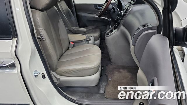 Kia Canival 2012 — photo 12