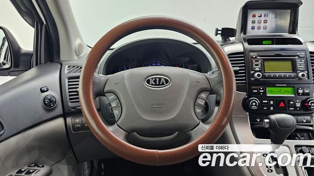 Kia Canival 2012 — photo 13