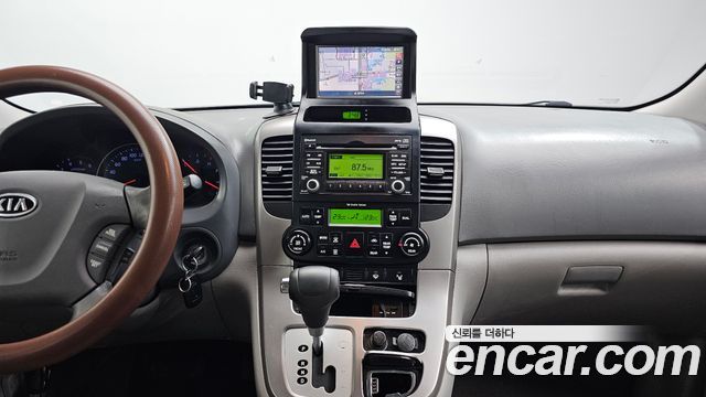 Kia Canival 2012 — photo 17