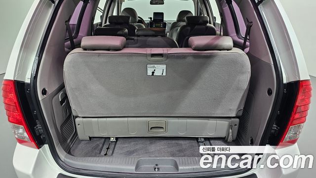 Kia Canival 2012 — photo 20