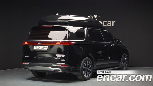 Kia Canival 2023 — photo 2