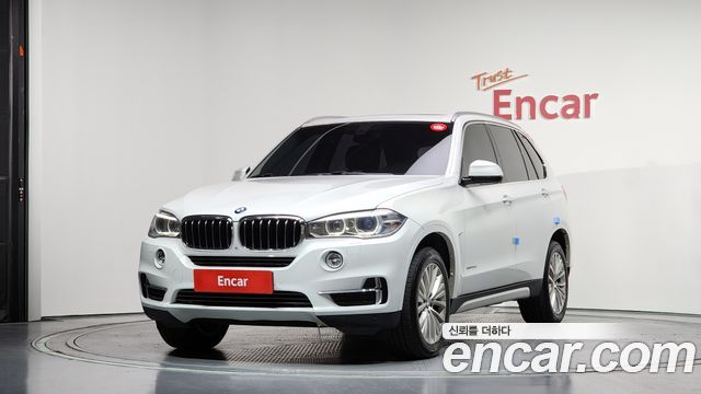 BMW X5 2014 — photo 1