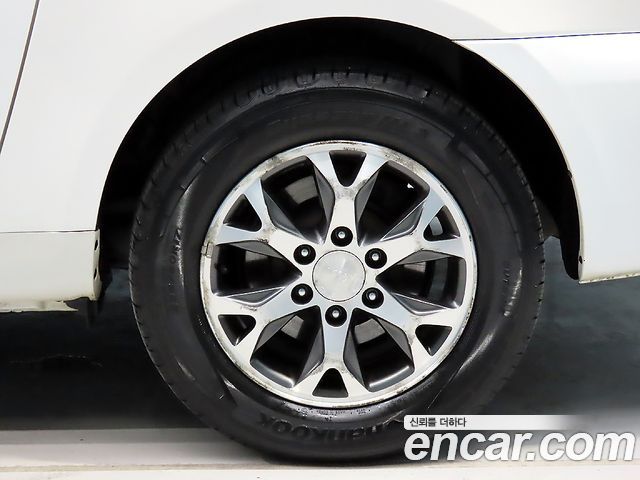 Kia Canival 2014 — photo 11