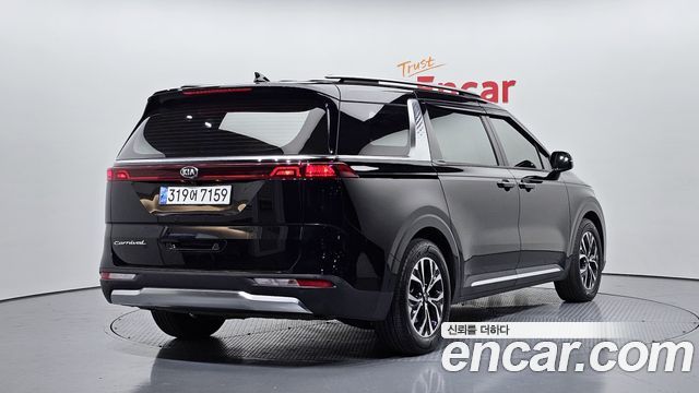 Kia Canival 2021 — photo 2