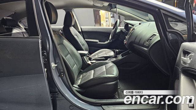 Kia K3 2013 — photo 11