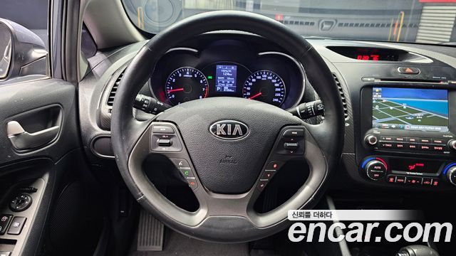 Kia K3 2013 — photo 13