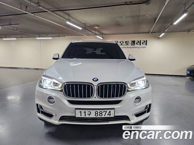BMW X5 2015 — photo 1