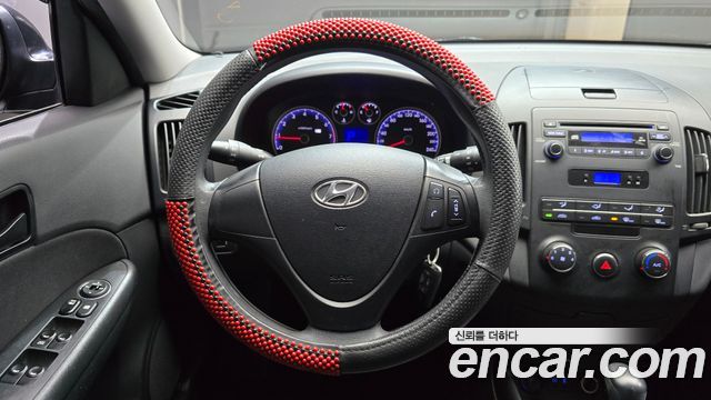 Hyundai i30 2010 — photo 13