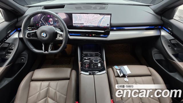 BMW 5-Series 2024 — photo 10