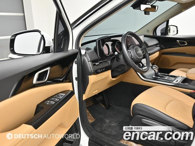 Kia Canival 2023 — photo 11