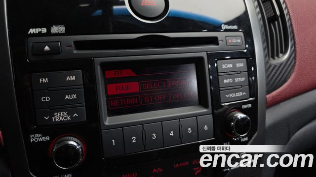 Kia Porte 2010 — photo 17