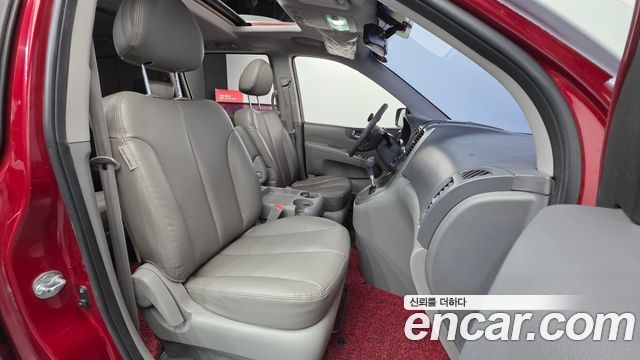 Kia Canival 2013 — photo 13