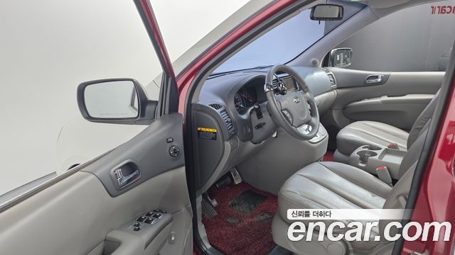 Kia Canival 2013 — photo 18