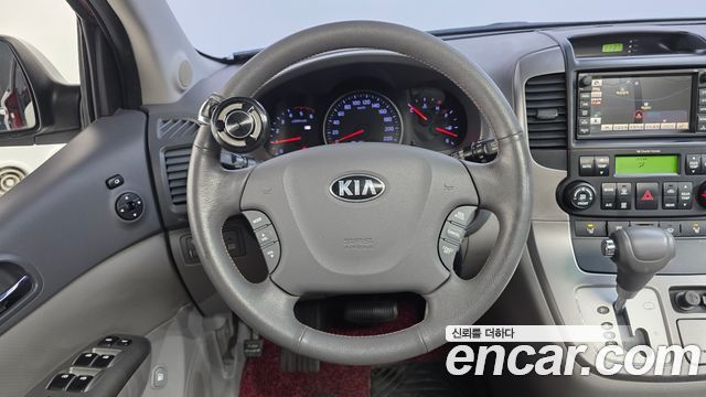 Kia Canival 2013 — photo 21