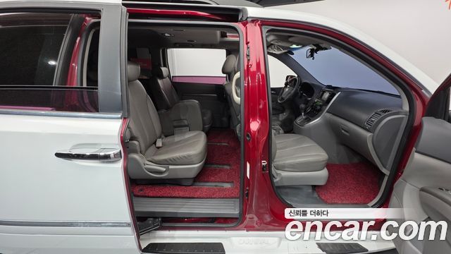 Kia Canival 2013 — photo 25