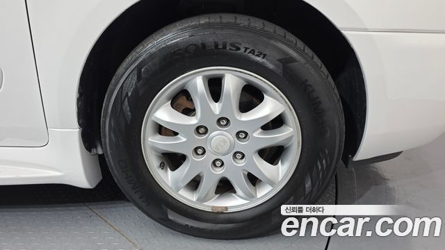 Kia Canival 2013 — photo 7