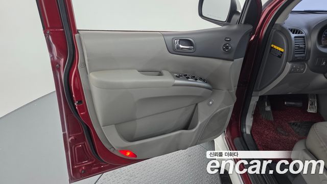 Kia Canival 2013 — photo 14