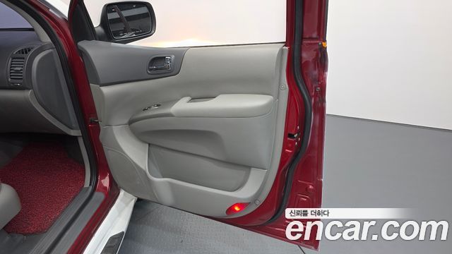 Kia Canival 2013 — photo 15