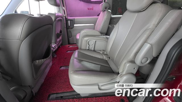 Kia Canival 2013 — photo 16