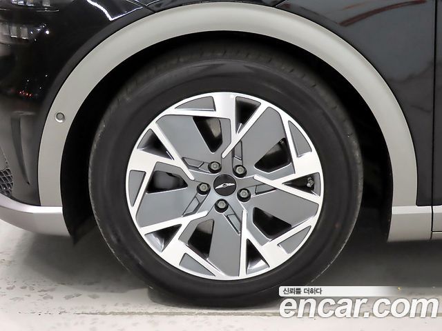 Genesis GV60 2022 — photo 20