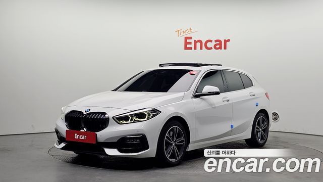 BMW 1-Series 2021 — photo 1