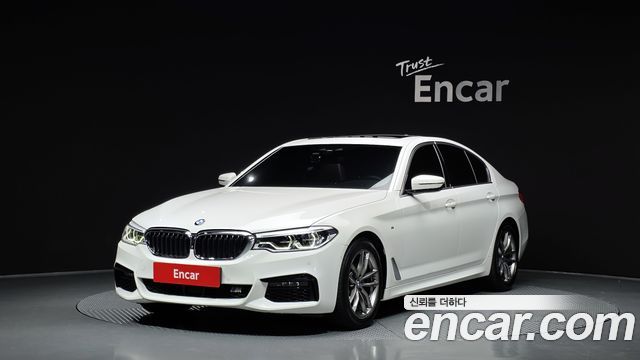 BMW 5-Series 2019 — photo 1