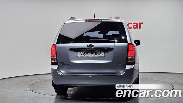 Kia Canival 2009 — photo 4
