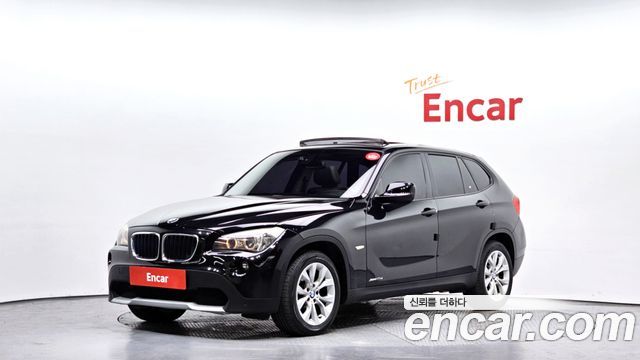 BMW X1 2010 — photo 1