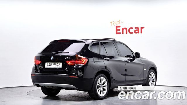 BMW X1 2010 — photo 2