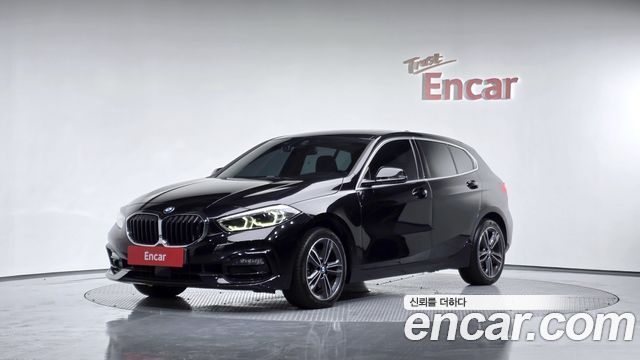 BMW 1-Series 2021 — photo 1
