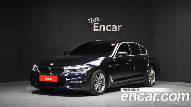 BMW 5-Series 2018 — photo 1
