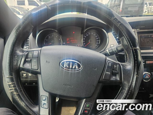 Kia K7 2011 — photo 12