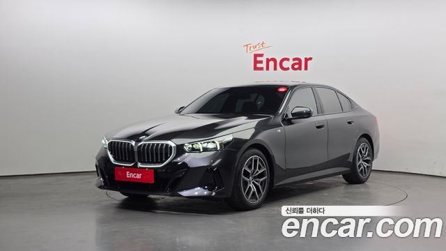 BMW 5-Series 2025 — photo 1