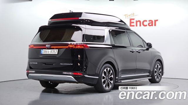 Kia Canival 2021 — photo 2
