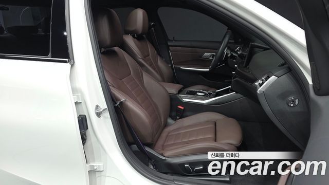 BMW 3-Series 2025 — photo 11