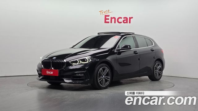 BMW 1-Series 2022 — photo 1