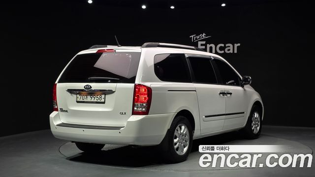 Kia Canival 2013 — photo 2