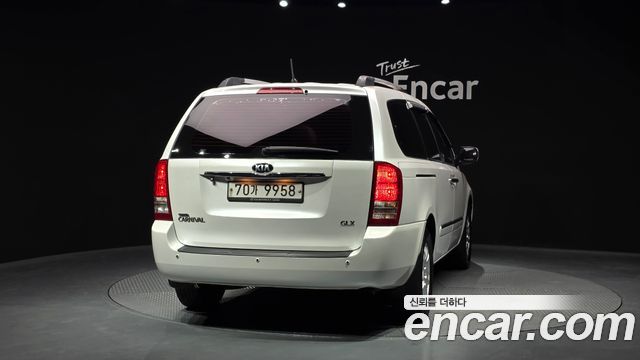 Kia Canival 2013 — photo 4