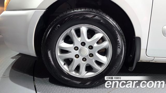 Kia Canival 2013 — photo 5